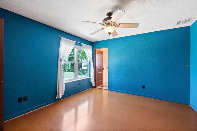 a view of a swimming pool with an outdoor seating and yard