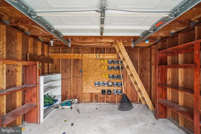 a view of a deck with wooden floor and floor to ceiling window