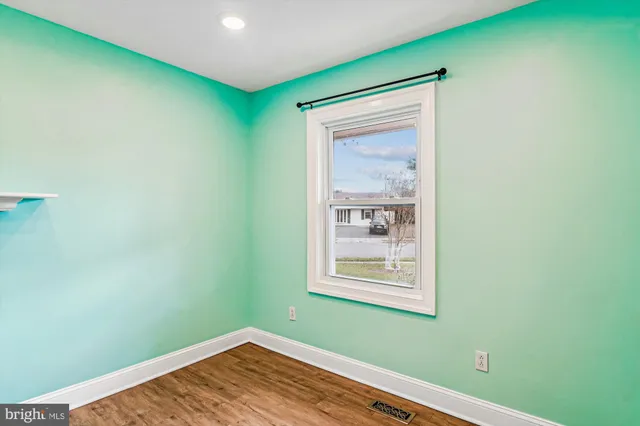 a kitchen with a sink stove and microwave
