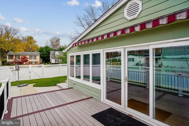 an empty room with wooden floor and closet
