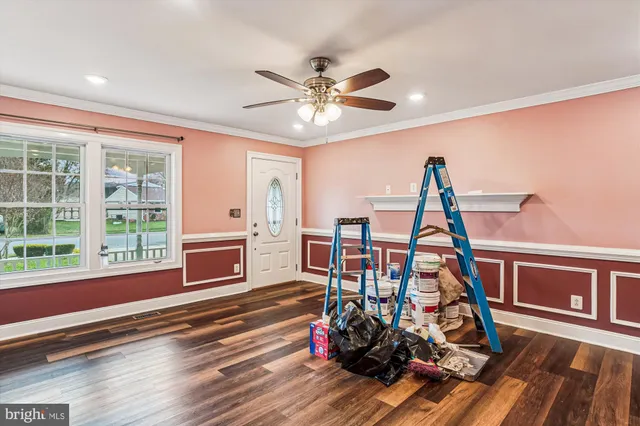 a view of livingroom with wooden floor and window
