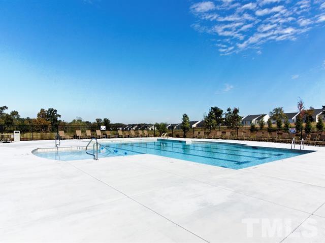 4124 Davis Meadow Street Raleigh, NC 27616 - Photo 14 of 15 a view of a swimming pool and an outdoor seating