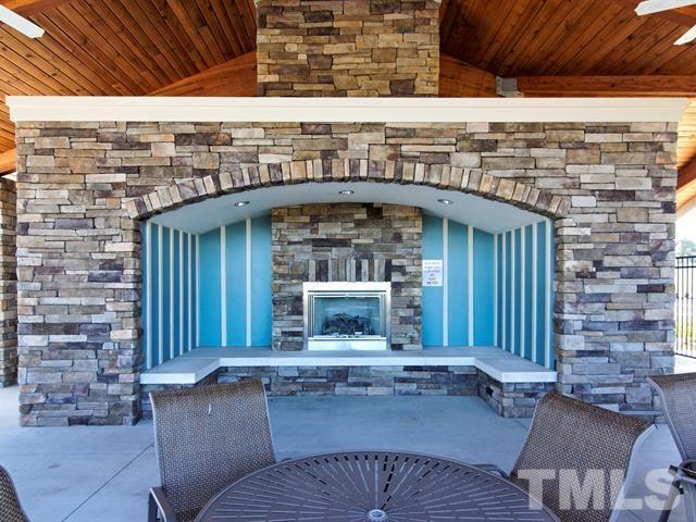 4124 Davis Meadow Street Raleigh, NC 27616 - Photo 9 of 15 a view of a chair and table in the patio