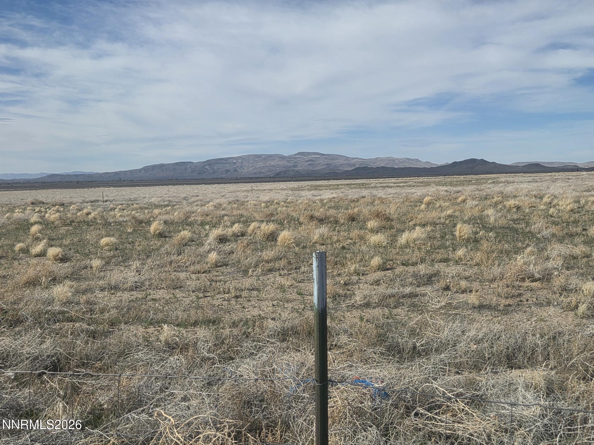 Par3 Rheta Lane Yerington, NV 89447 - Photo 5 of 6 a view of a yard with an outdoor space