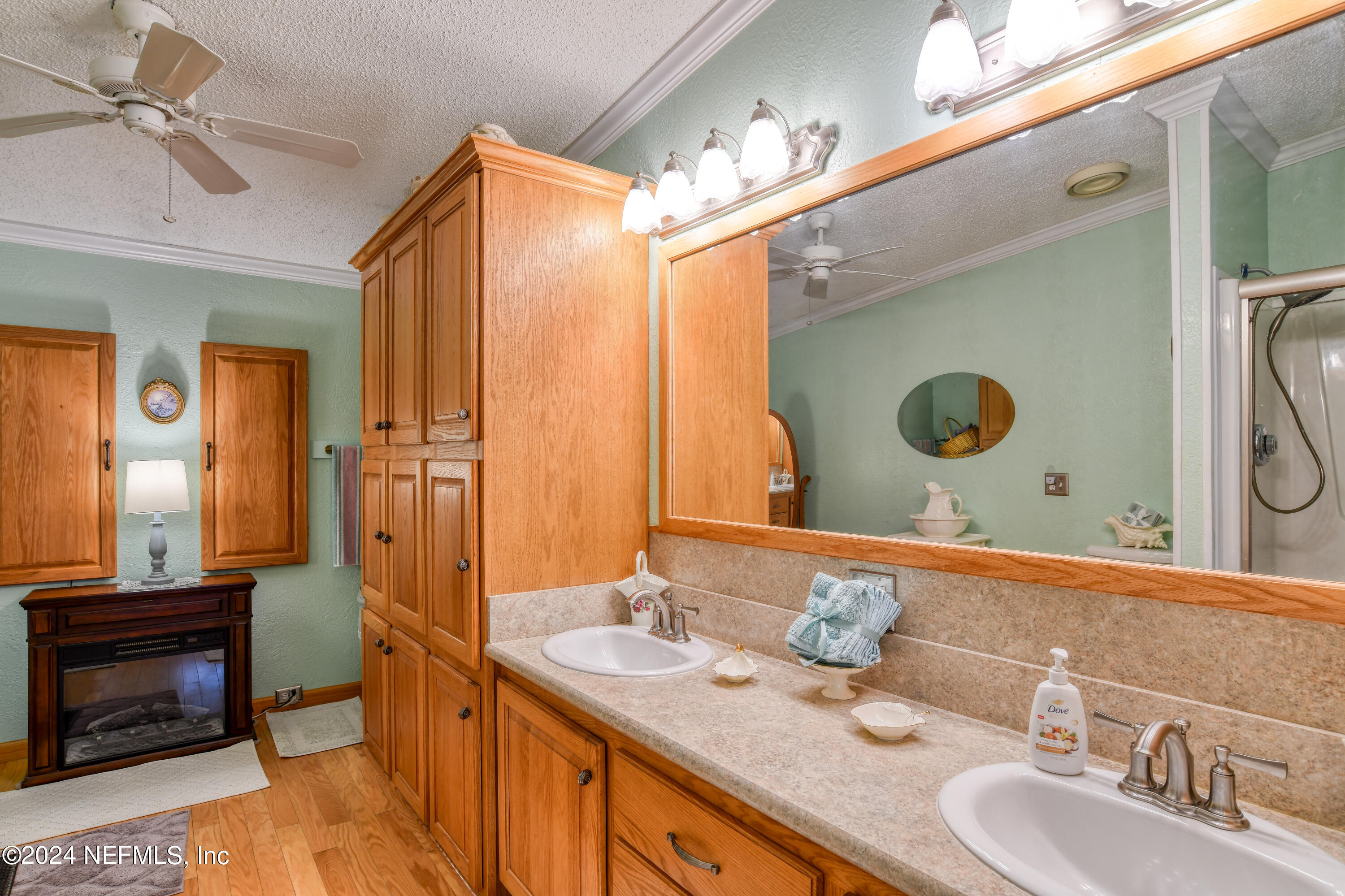 131 Sunset Drive Crescent City, FL 32112 - Photo 11 of 33 a bathroom with a double vanity sink mirror and double