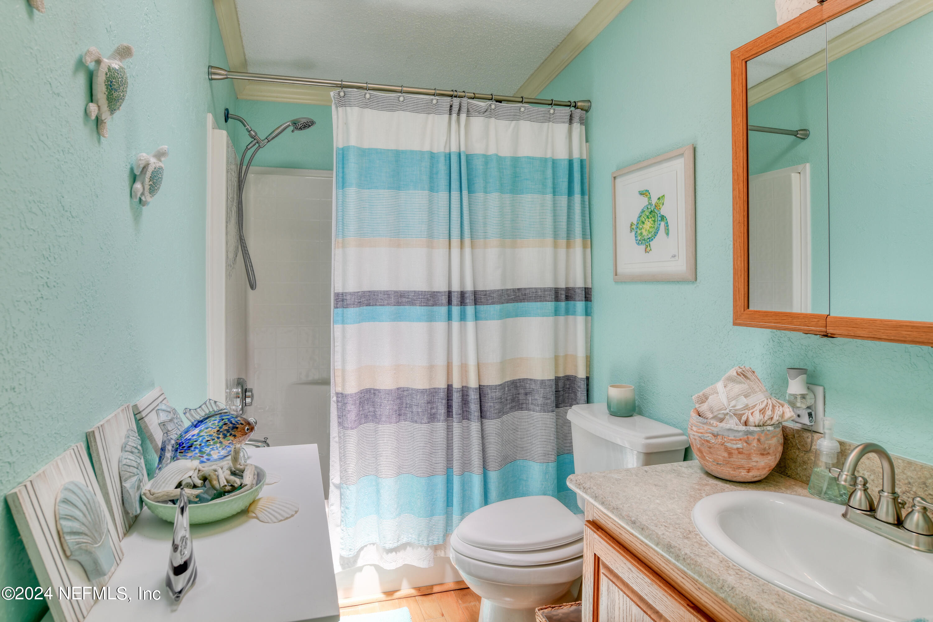 131 Sunset Drive Crescent City, FL 32112 - Photo 13 of 33 a bathroom with a sink toilet and shower