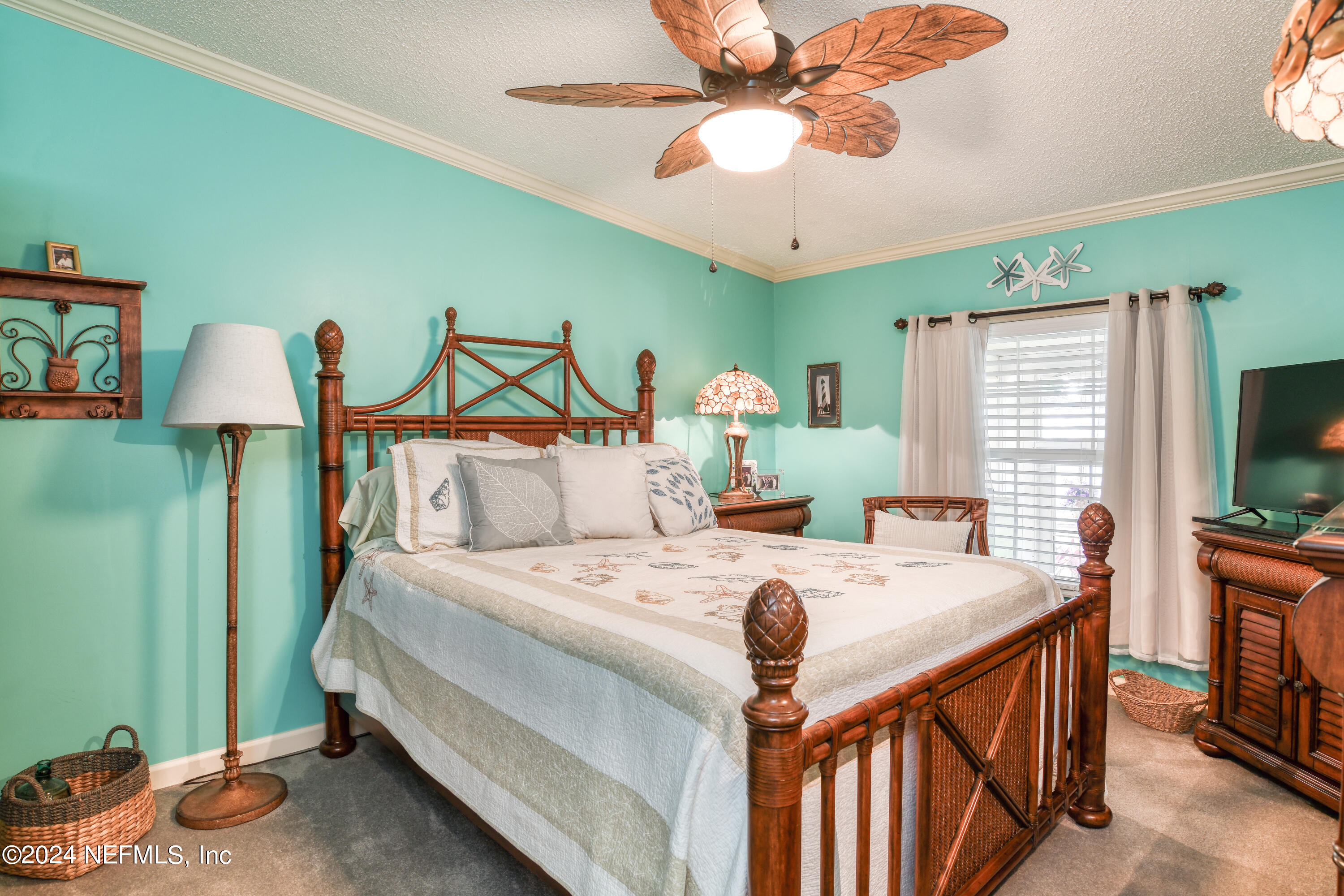 131 Sunset Drive Crescent City, FL 32112 - Photo 14 of 33 a bed room with a bed and a chandelier