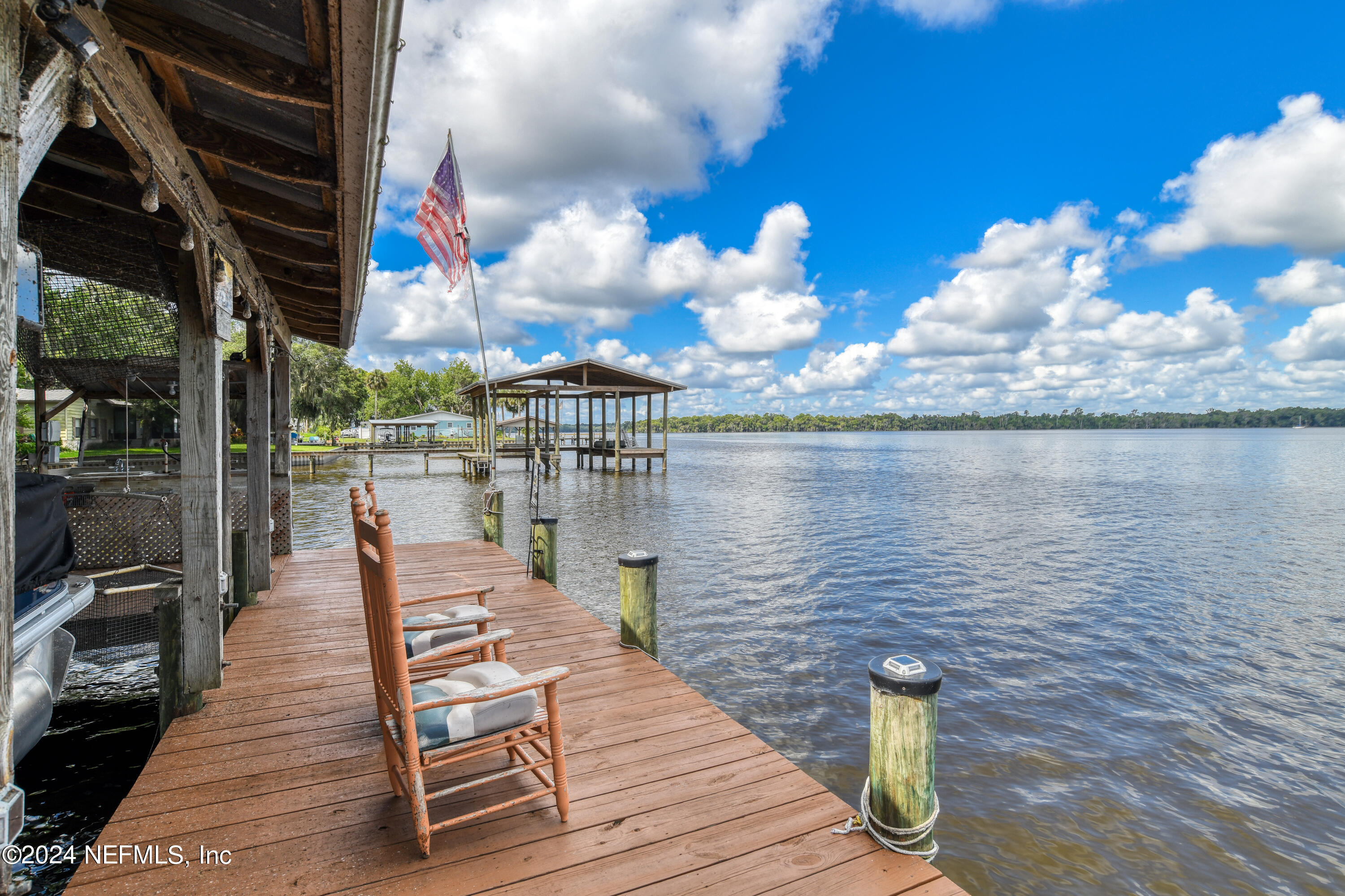 131 Sunset Drive Crescent City, FL 32112 - Photo 22 of 33 a view of a lake from a roof deck