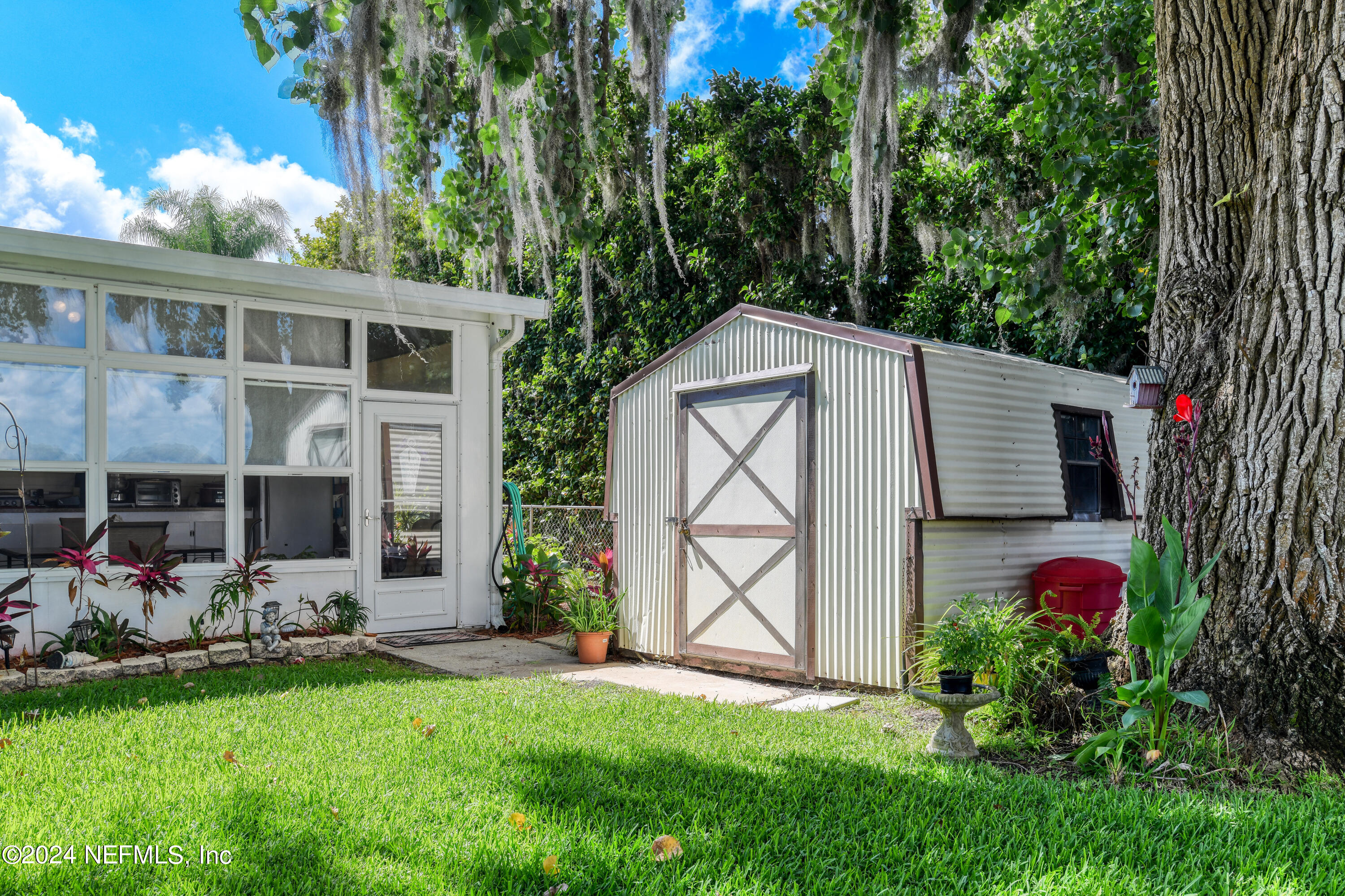 131 Sunset Drive Crescent City, FL 32112 - Photo 30 of 33 a front view of a house with garden