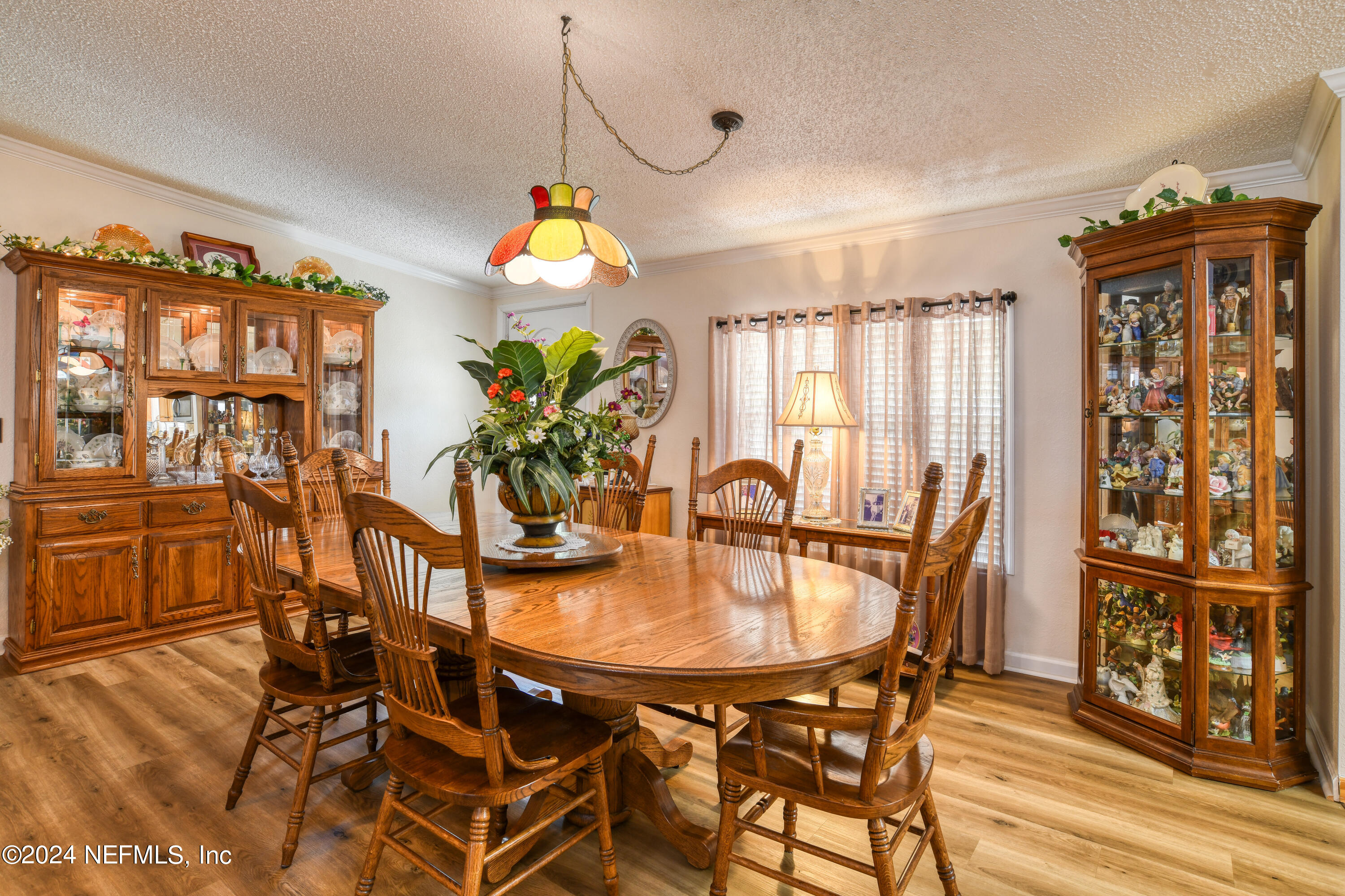 131 Sunset Drive Crescent City, FL 32112 - Photo 5 of 33 a dining room with furniture and window