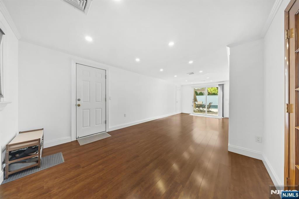 62 Sycamore Road Dumont, NJ 07628 - Photo 13 of 43 a view of empty room with wooden floor