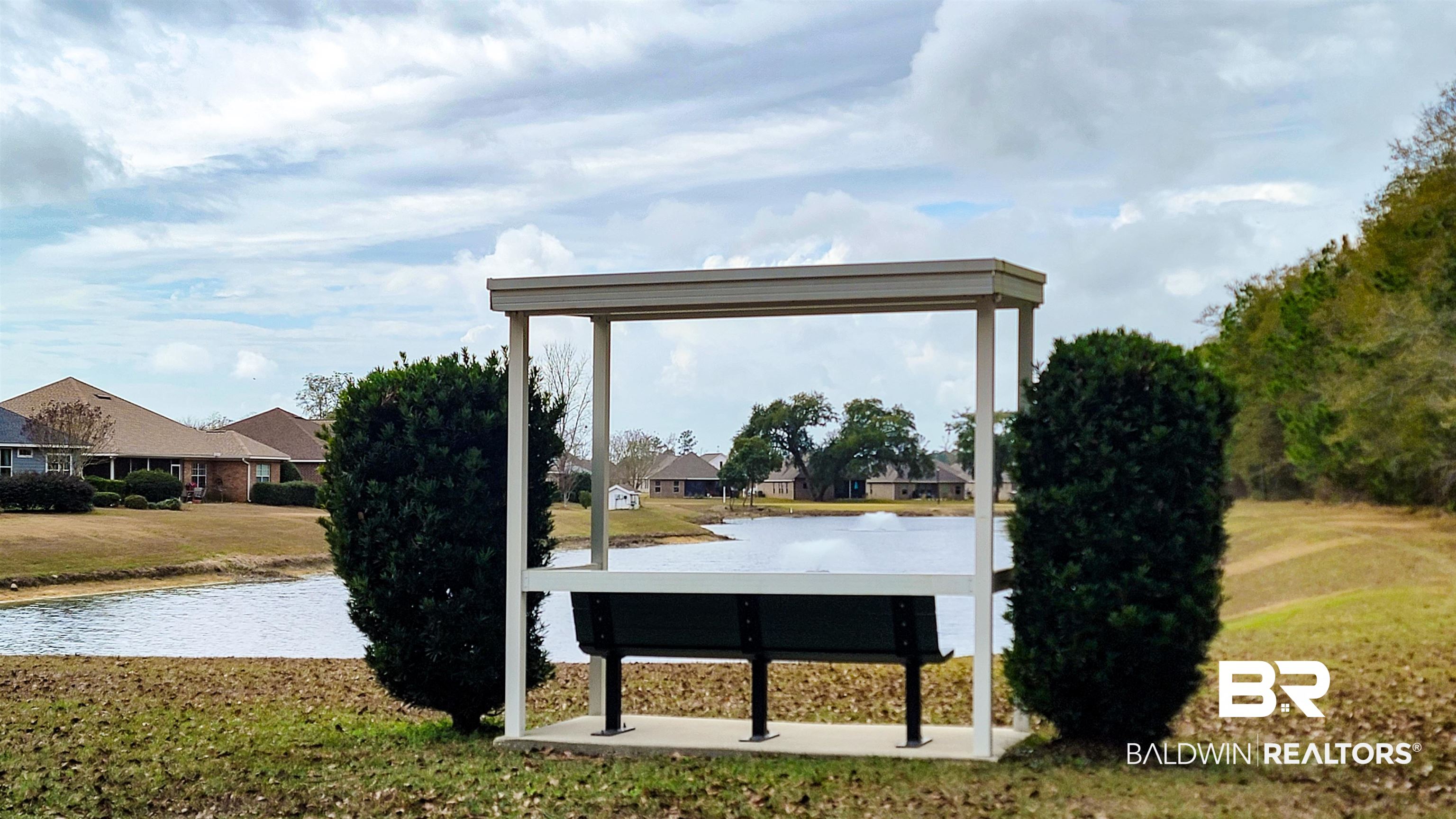 214 Hemingway Loop Foley, AL 36535 - Photo 57 of 67 View of grassy yard featuring a water view