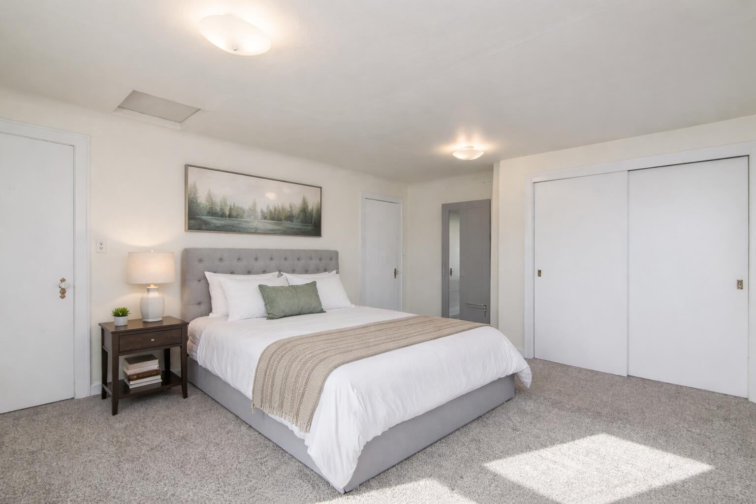 3554 South 84th Street, Unit 3554A Milwaukee, WI 53228 - Photo 18 of 24 Large primary bedroom virtually staged
