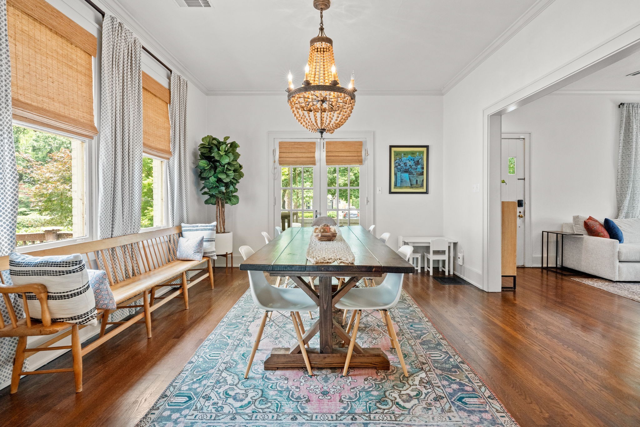 229 Lauderdale Road Nashville, TN 37205 - Photo 11 of 48 a view of a dining room with furniture wooden floor and a chandelier