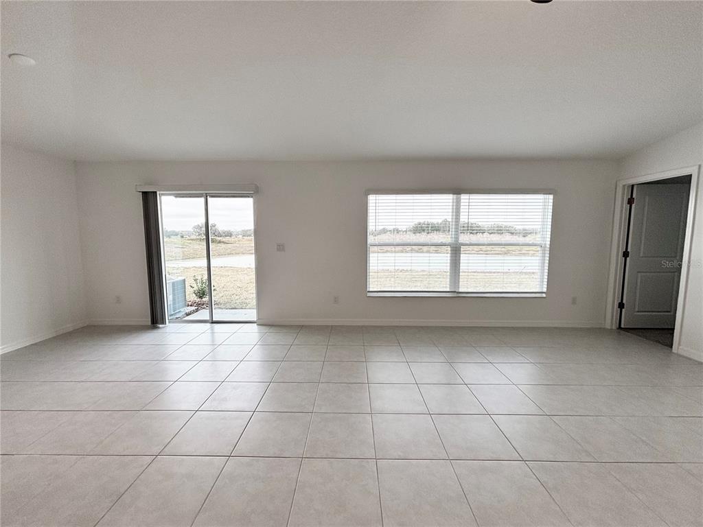 11237 Linden Depot Road San Antonio, FL 33576 - Photo 11 of 31 a view of an empty room with a window