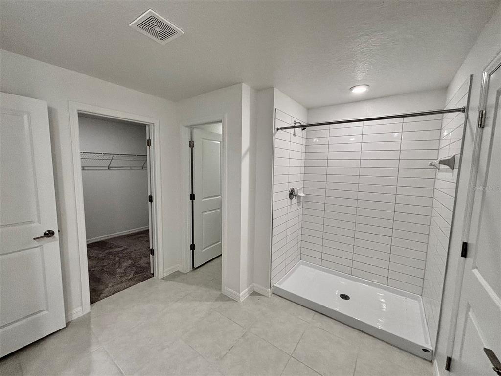 11237 Linden Depot Road San Antonio, FL 33576 - Photo 19 of 31 a bathroom with a shower