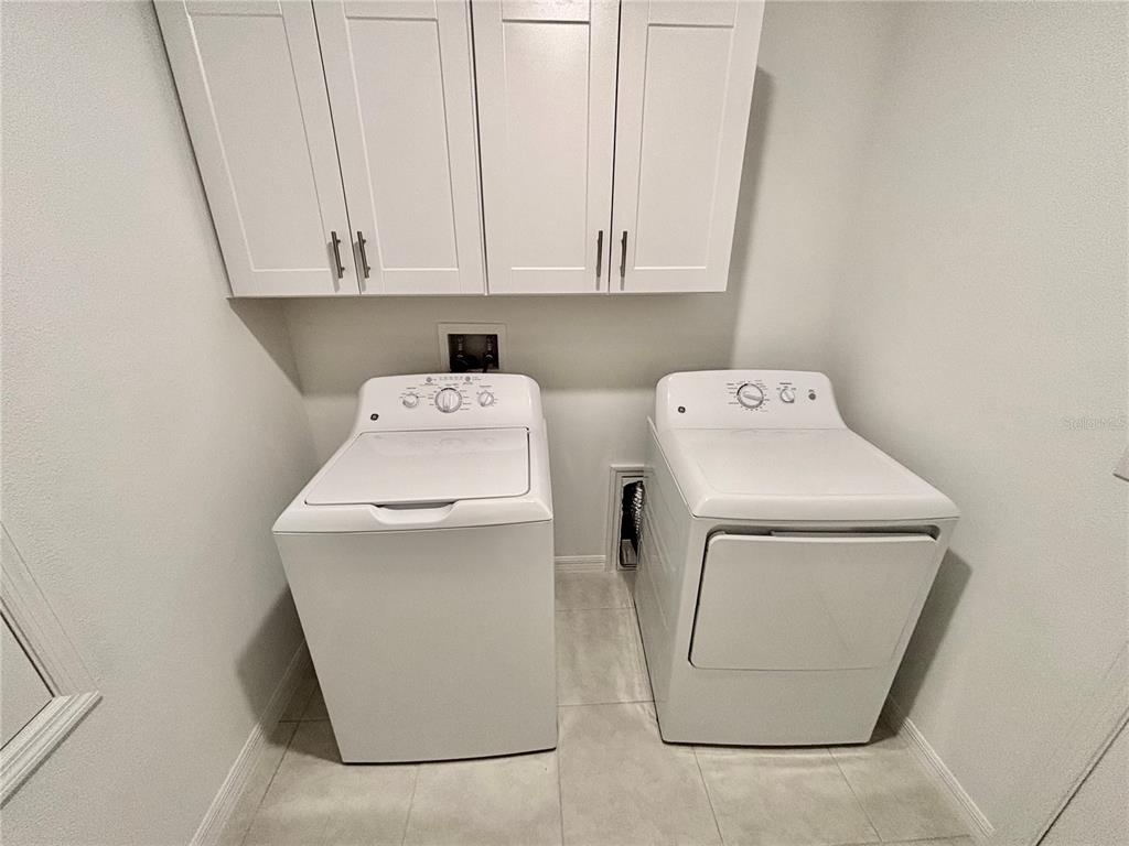 11237 Linden Depot Road San Antonio, FL 33576 - Photo 22 of 31 a utility room with dryer and washer
