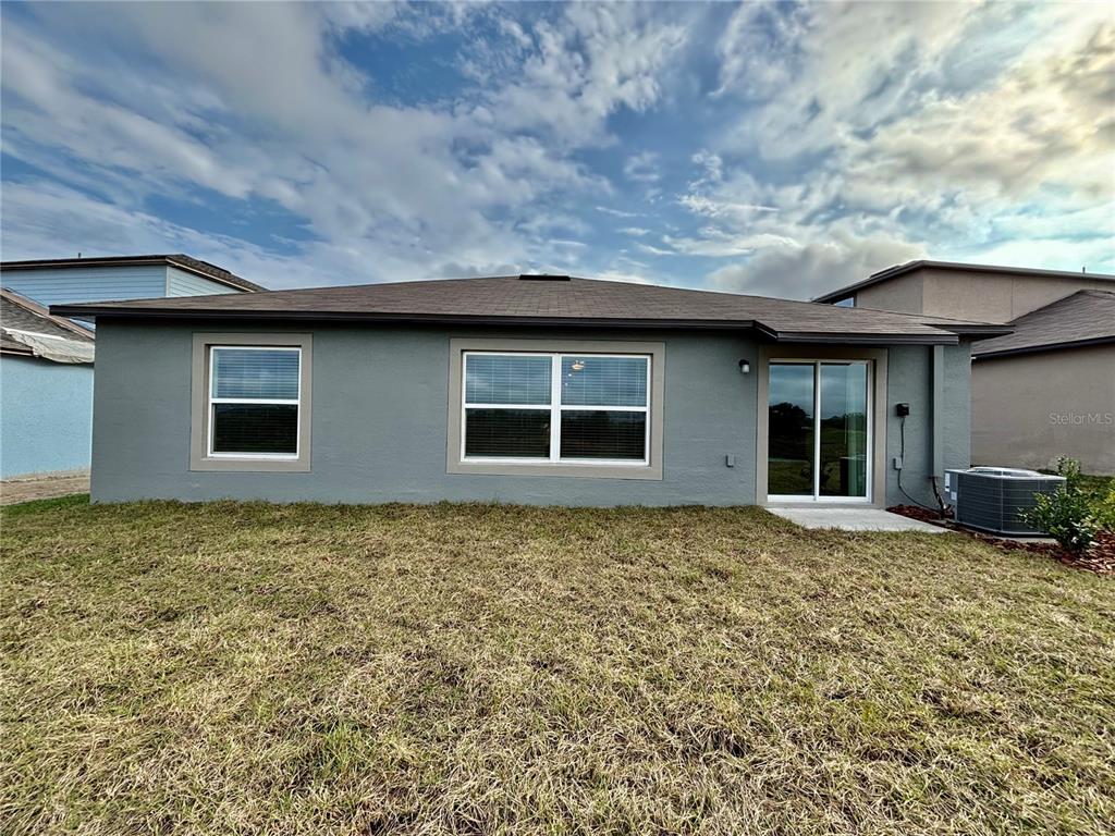11237 Linden Depot Road San Antonio, FL 33576 - Photo 26 of 31 a house view with a garden space