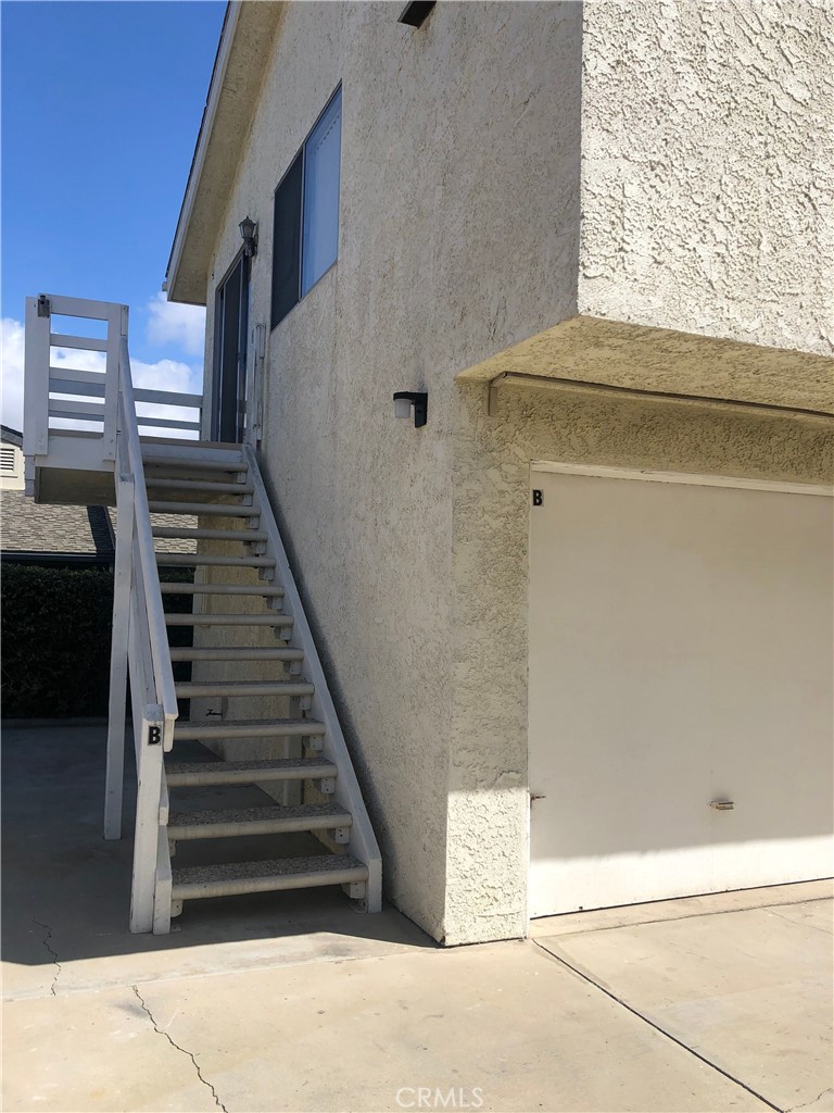 16621 Dolores Lane, Unit B Huntington Beach, CA 92649 - Photo 1 of 22 a view of entryway