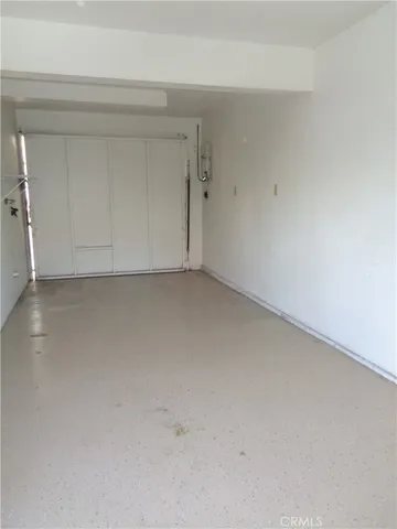 a bathroom with a sink and cabinets