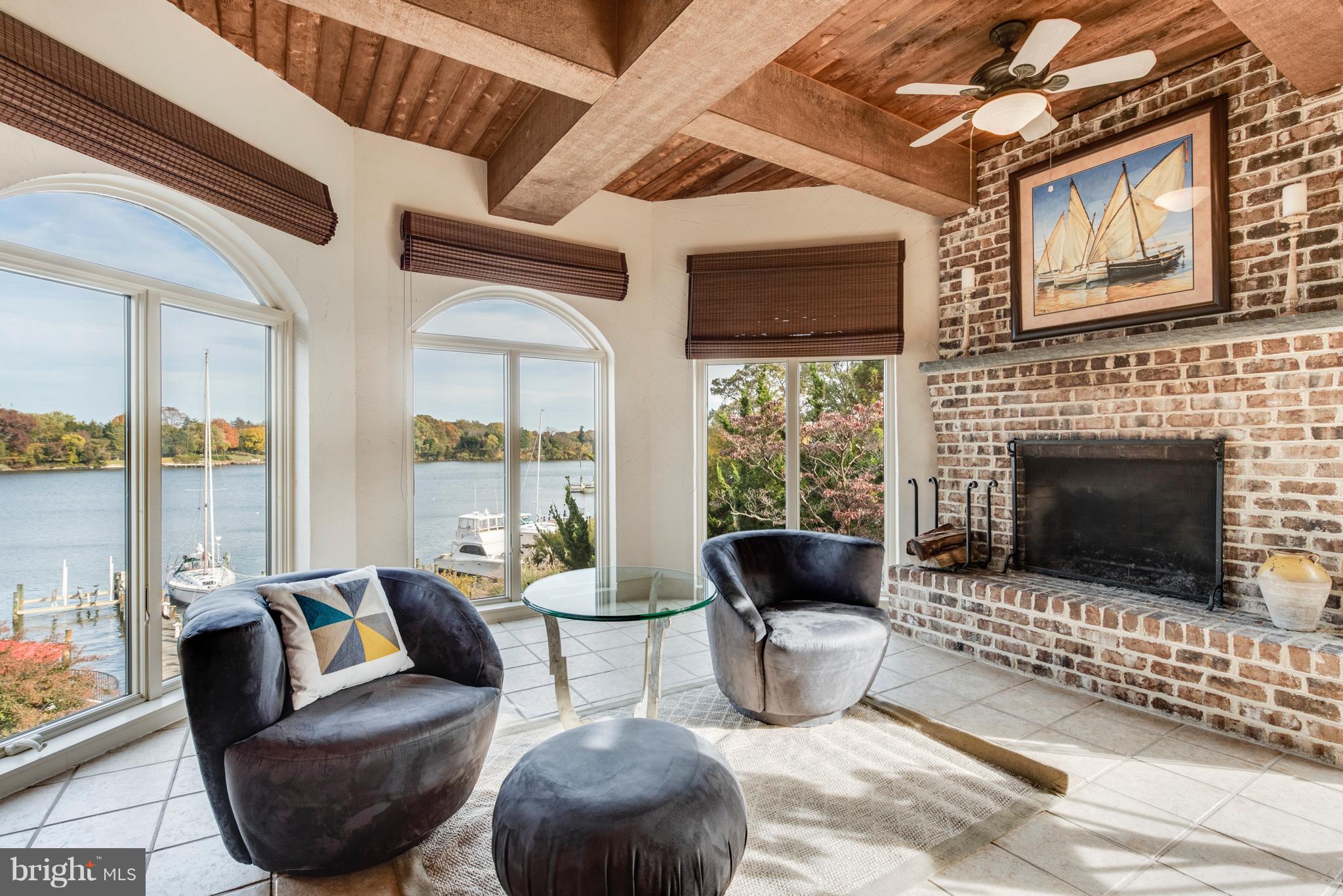 1795 Beachfield Road Annapolis, MD 21409 - Photo 38 of 49 a living room with furniture and a fireplace