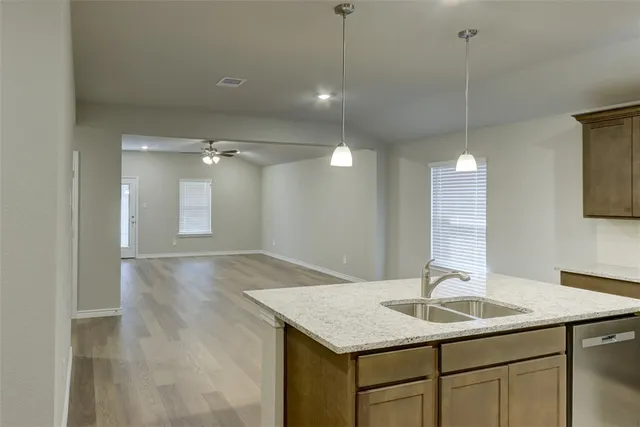 a bathroom with a sink and a shower