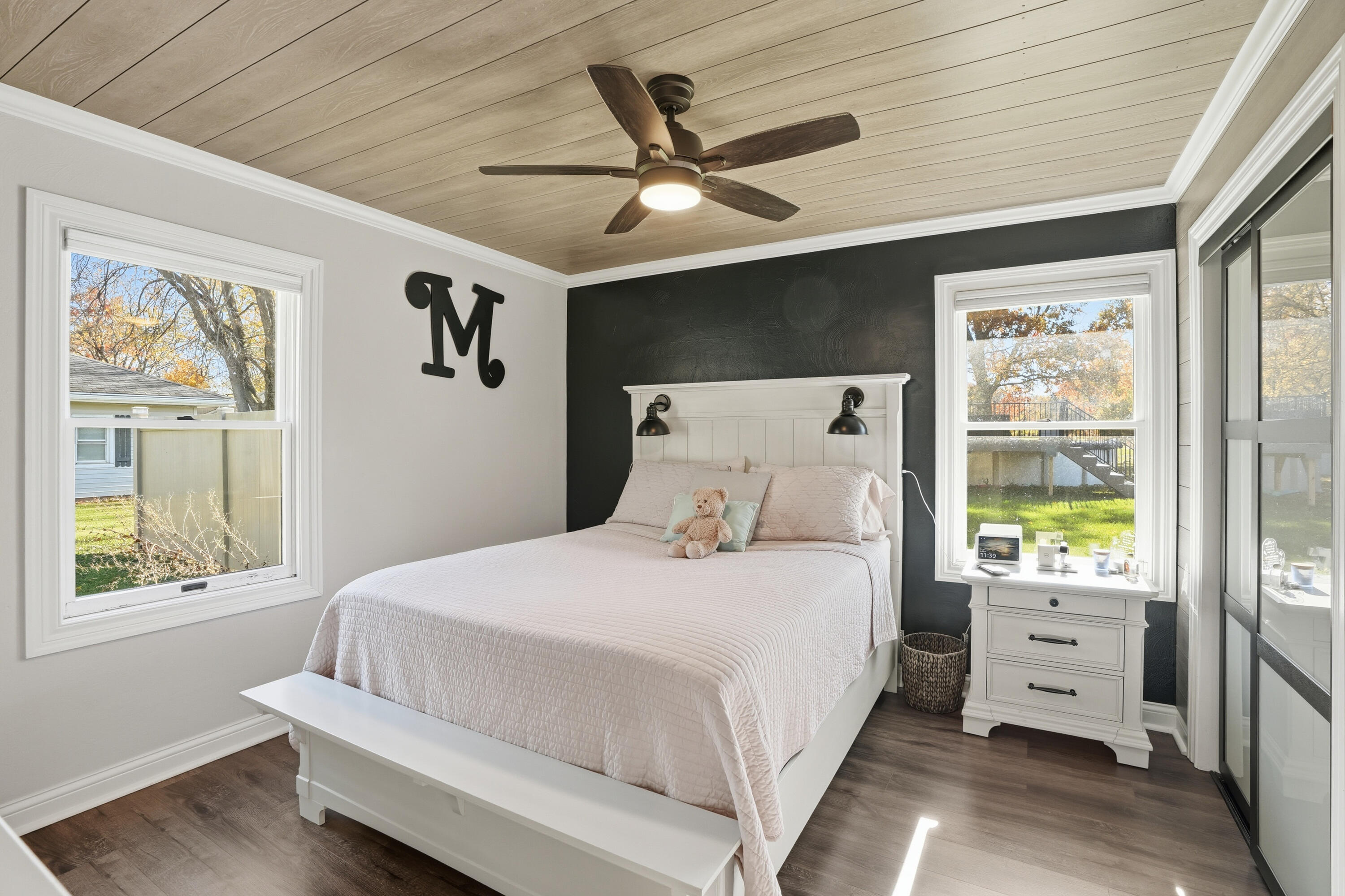 3725 West 105th Avenue Crown Point, IN 46307 - Photo 11 of 37 a bedroom with a large bed and a window