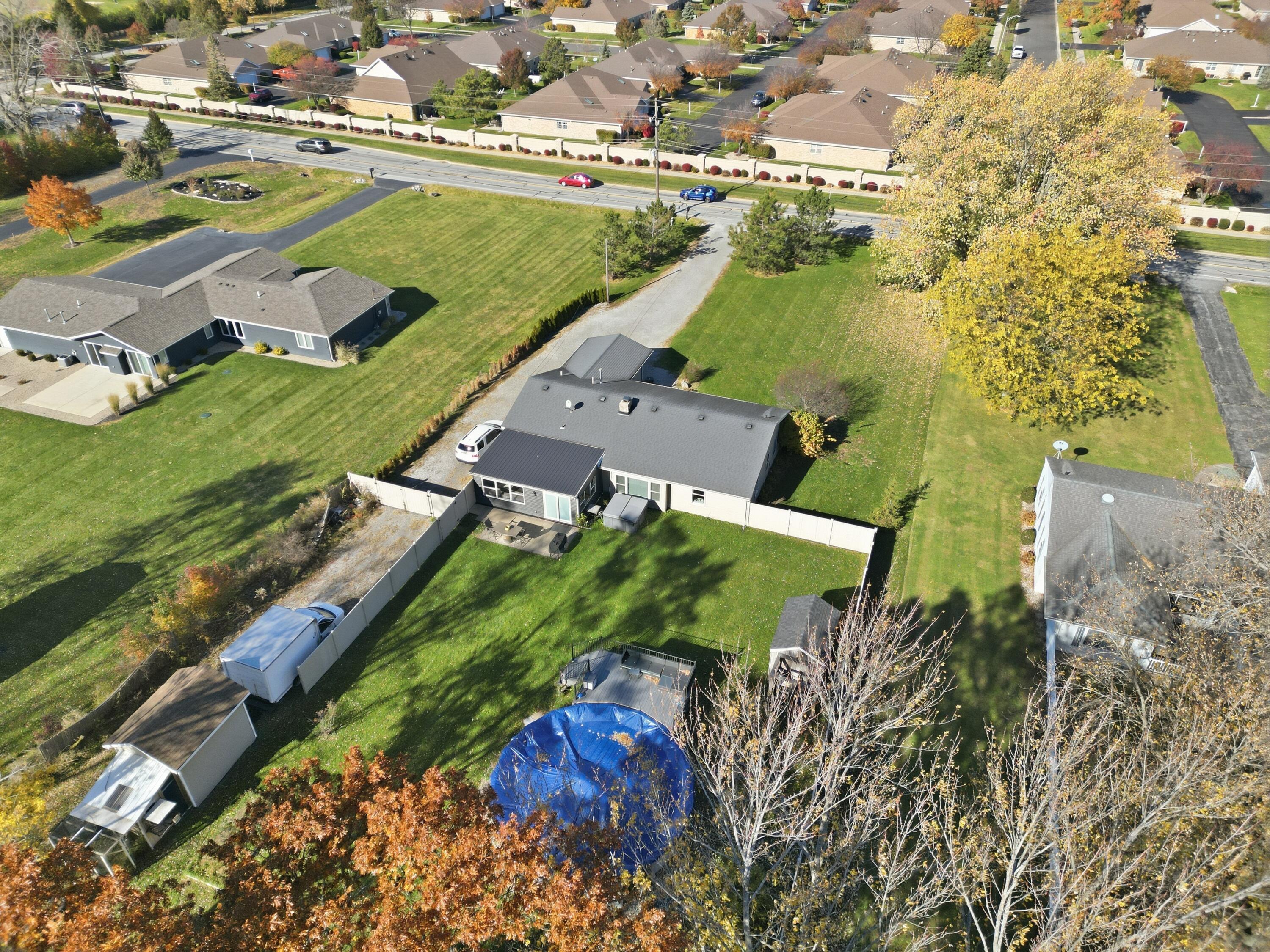 3725 West 105th Avenue Crown Point, IN 46307 - Photo 15 of 37 an aerial view of a house with a garden