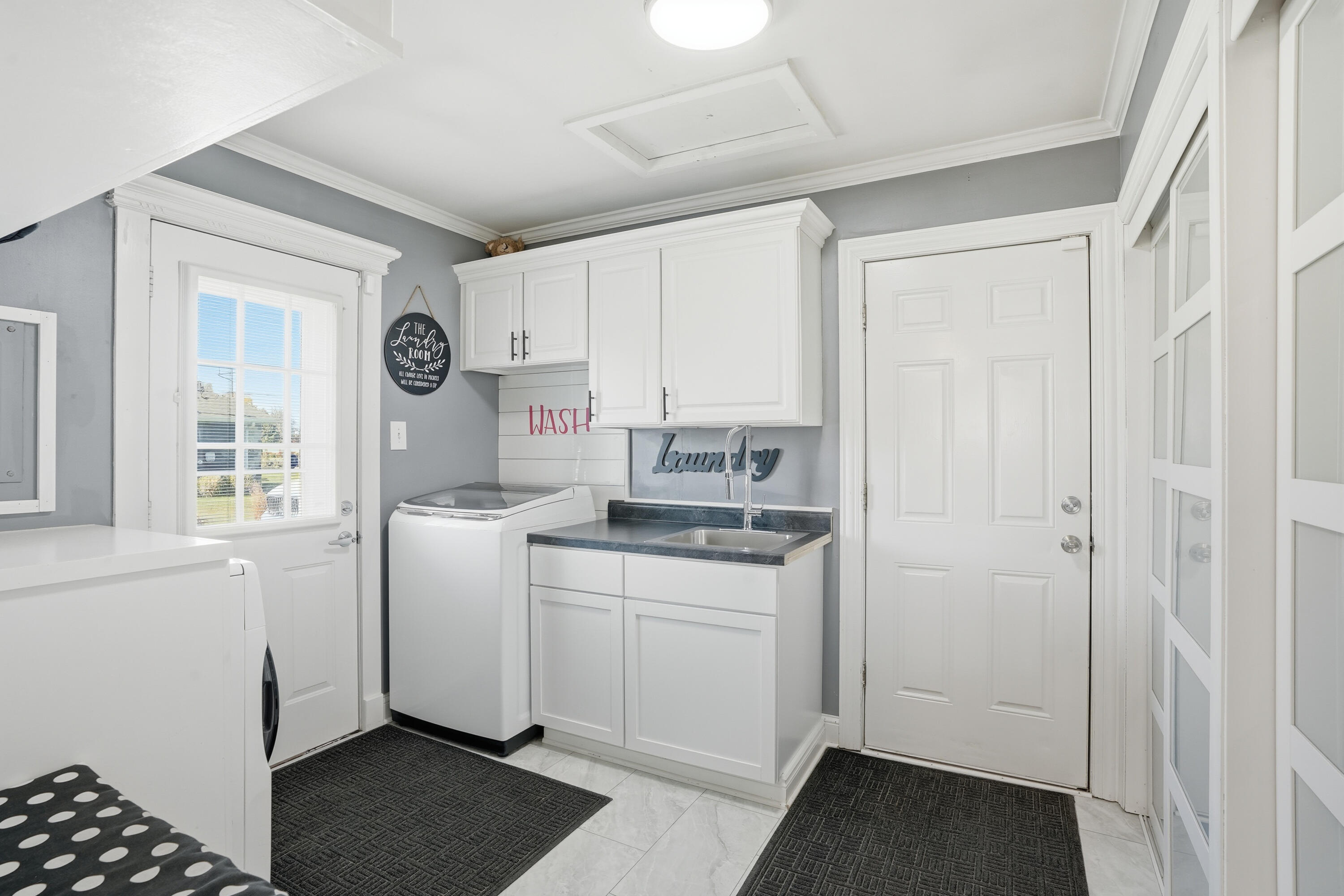 3725 West 105th Avenue Crown Point, IN 46307 - Photo 22 of 37 a room with a sink and a window