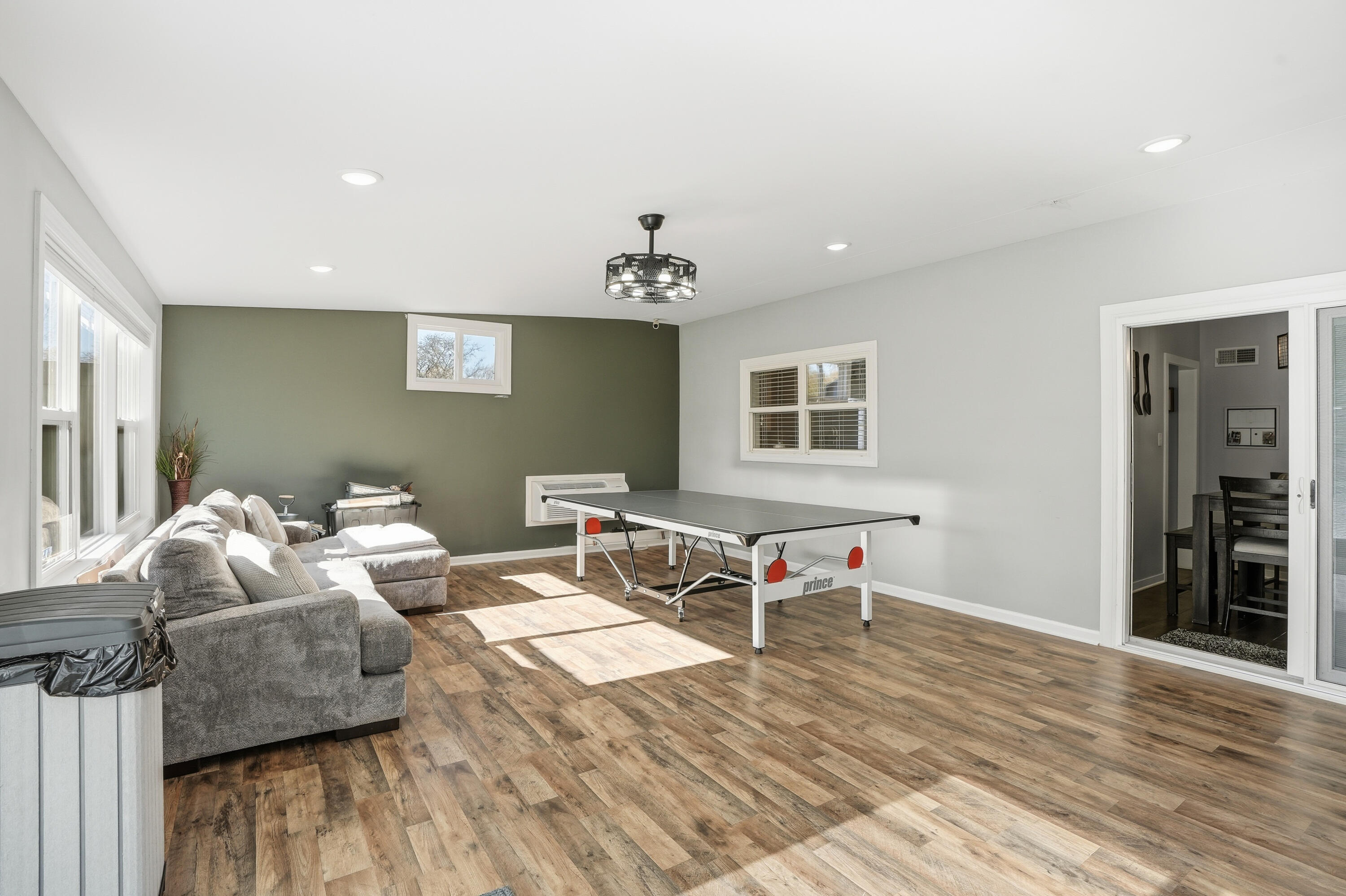 3725 West 105th Avenue Crown Point, IN 46307 - Photo 27 of 37 a living room with furniture and a wooden floor