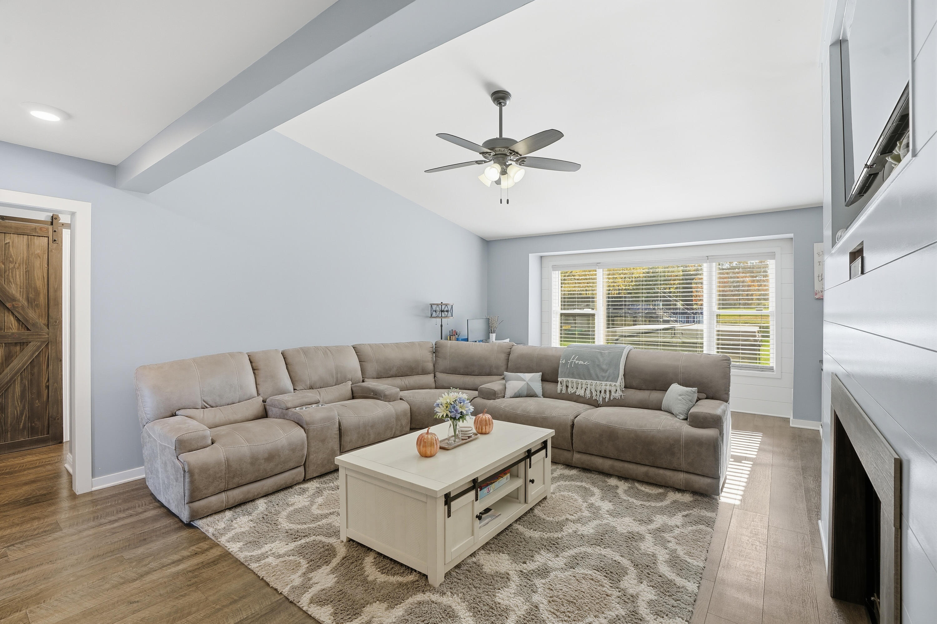 3725 West 105th Avenue Crown Point, IN 46307 - Photo 31 of 37 a living room with furniture and a large window