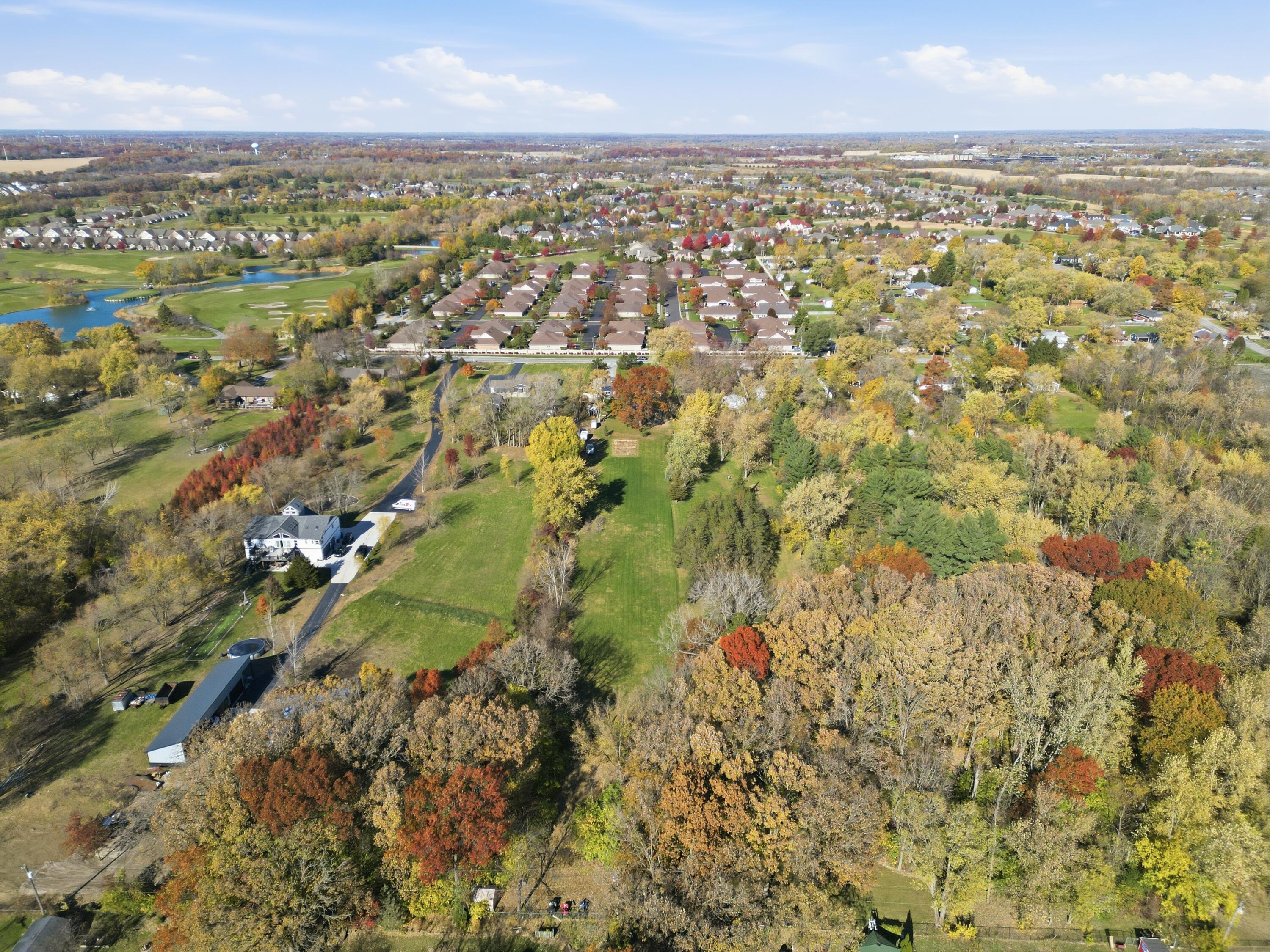 3725 West 105th Avenue Crown Point, IN 46307 - Photo 32 of 37 an aerial view of residential building with parking space