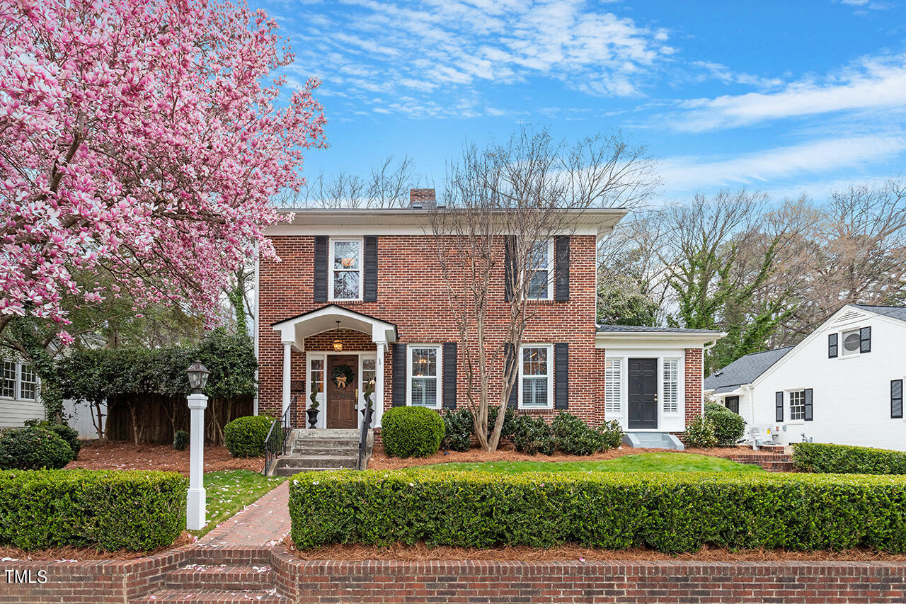 1310 Williamson Drive Raleigh, NC 27608 - Photo 1 of 43 front view of a house with a yard