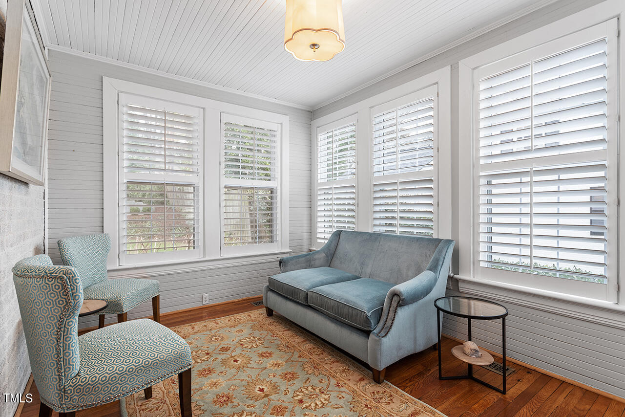 1310 Williamson Drive Raleigh, NC 27608 - Photo 15 of 43 a living room with furniture and a window