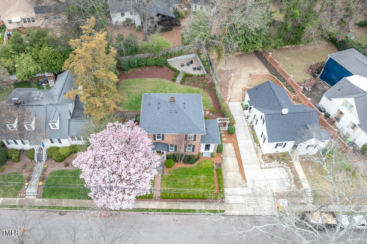 1310 Williamson Drive Raleigh, NC 27608 - Photo 36 of 43 an aerial view of a house with a yard