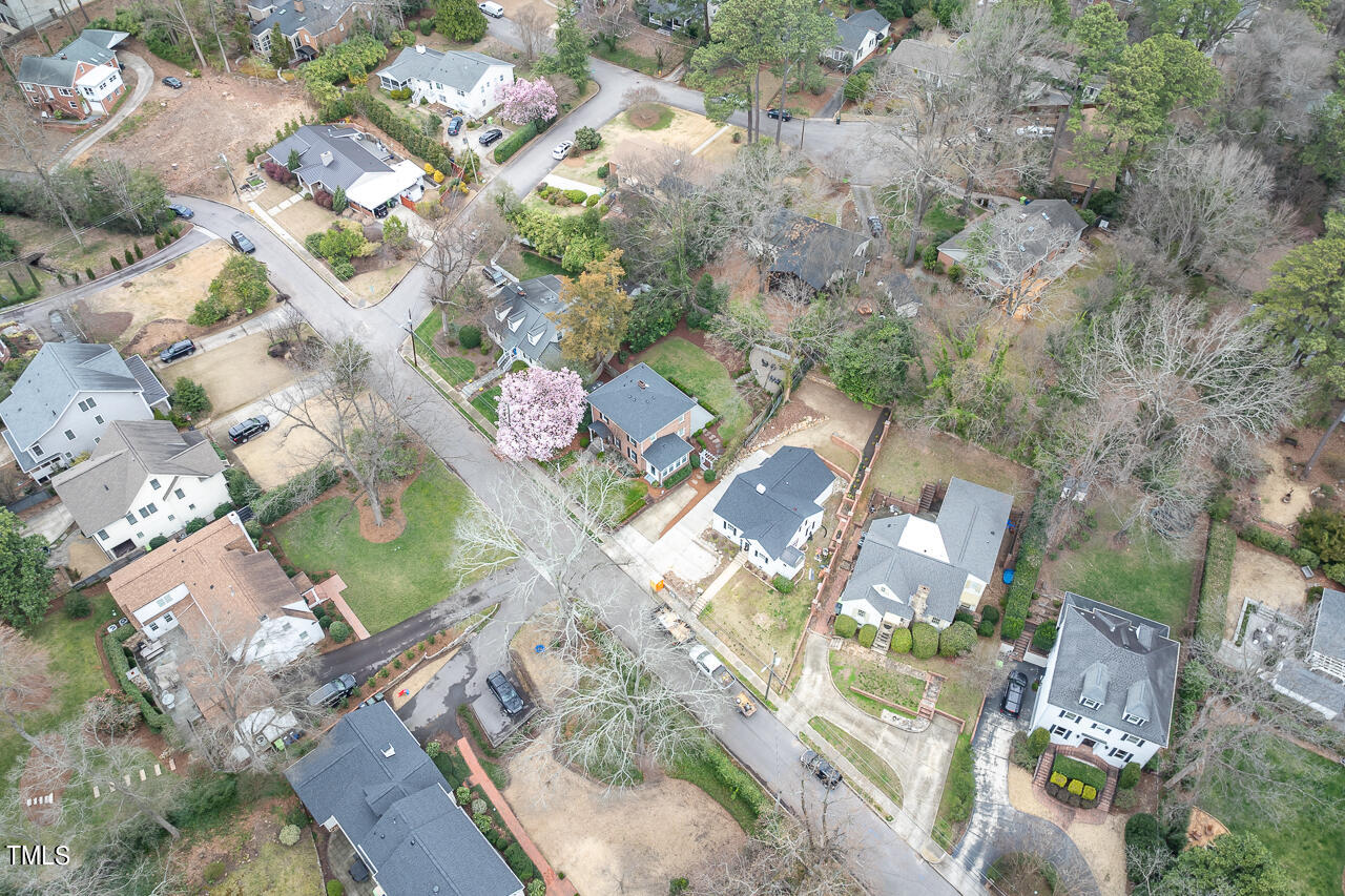 1310 Williamson Drive Raleigh, NC 27608 - Photo 41 of 43 an aerial view of residential houses with outdoor space
