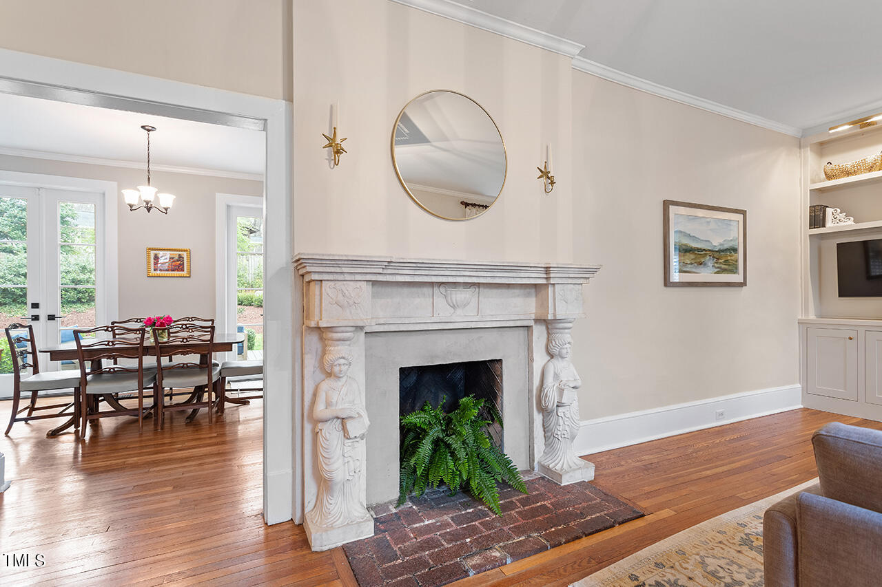 1310 Williamson Drive Raleigh, NC 27608 - Photo 10 of 43 a living room with furniture and a fireplace
