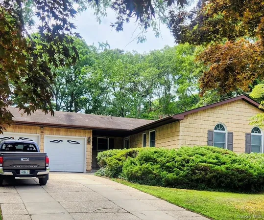 a car parked in front of a house with a car parked
