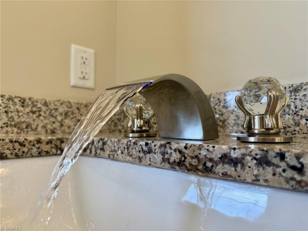 2212 Becks Church Road Lexington, NC 27292 - Photo 15 of 34 Featuring safety faucets and crystal handles.