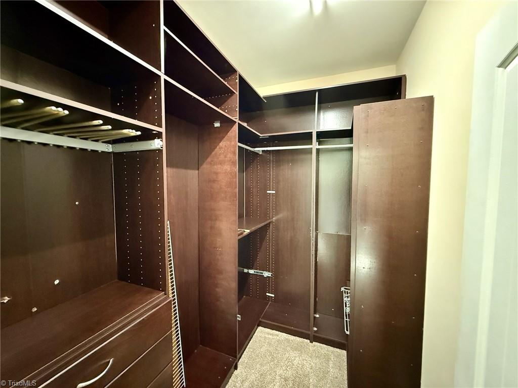 2212 Becks Church Road Lexington, NC 27292 - Photo 17 of 34 Primary closet with plenty of built-in storage!