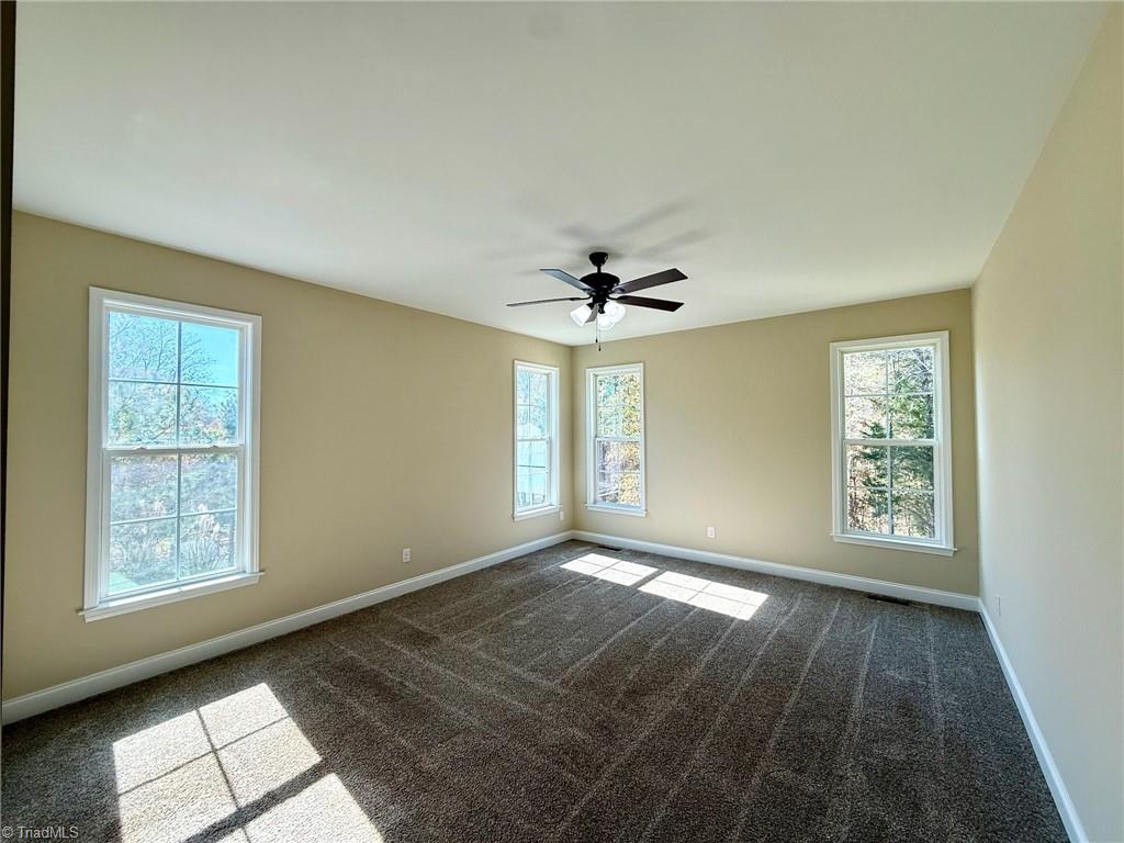 2212 Becks Church Road Lexington, NC 27292 - Photo 18 of 34 Primary bedroom with plenty of warm natural light!