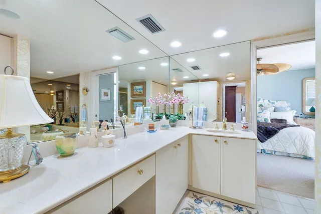 a kitchen with sink and window