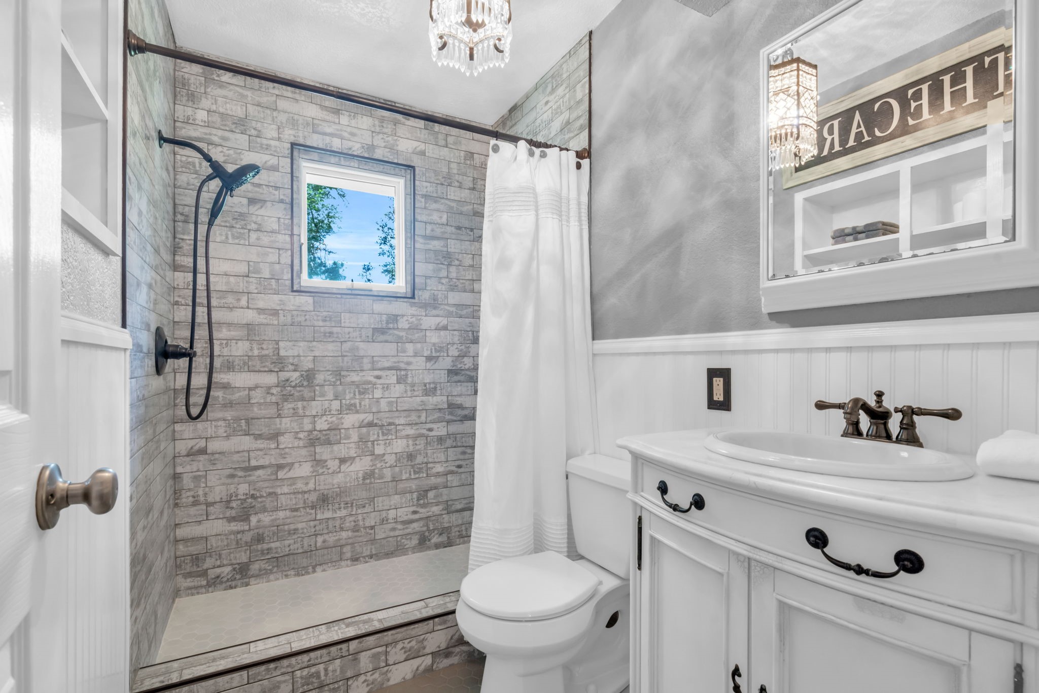 17821 Brown Road Conroe, TX 77306 - Photo 27 of 50 a bathroom with a sink toilet and shower