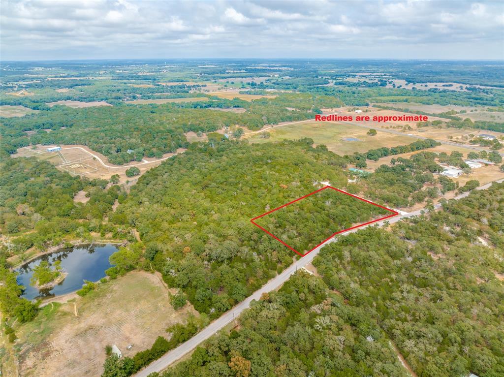 209 Red Top Road Valley View, TX 76272 - Photo 4 of 8 a view of an outdoor space and a lake view