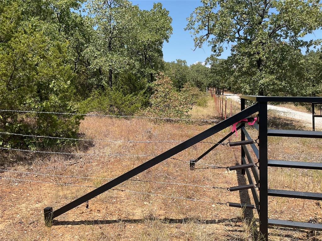 209 Red Top Road Valley View, TX 76272 - Photo 8 of 8 a view of swimming pool from a lake
