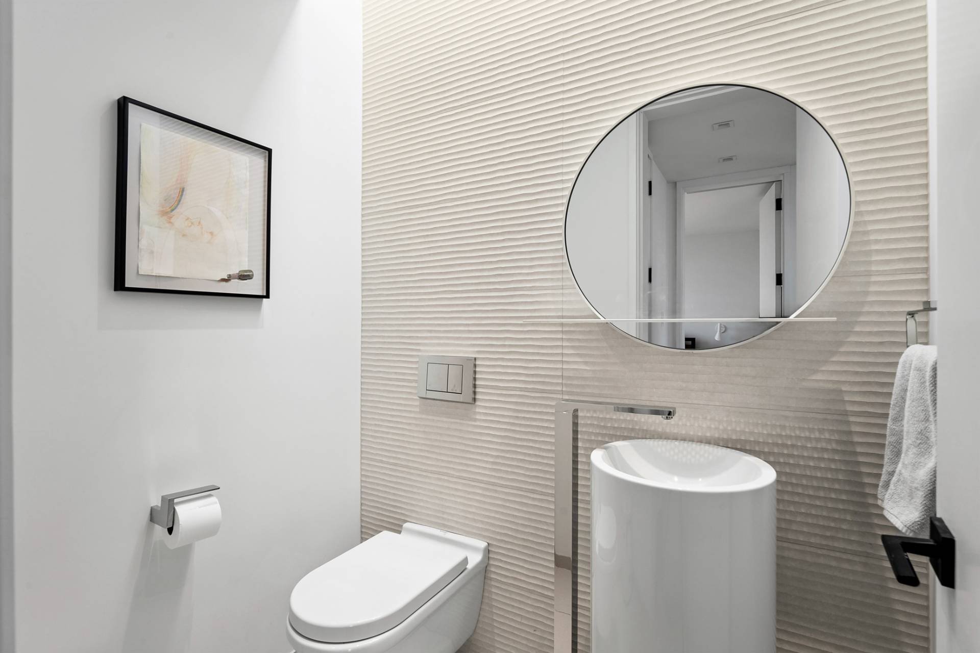 15 Deforest Road Montauk, NY 11954 - Photo 8 of 22 a bathroom with a toilet sink and mirror