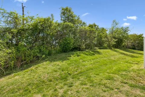 a view of an outdoor space and a yard