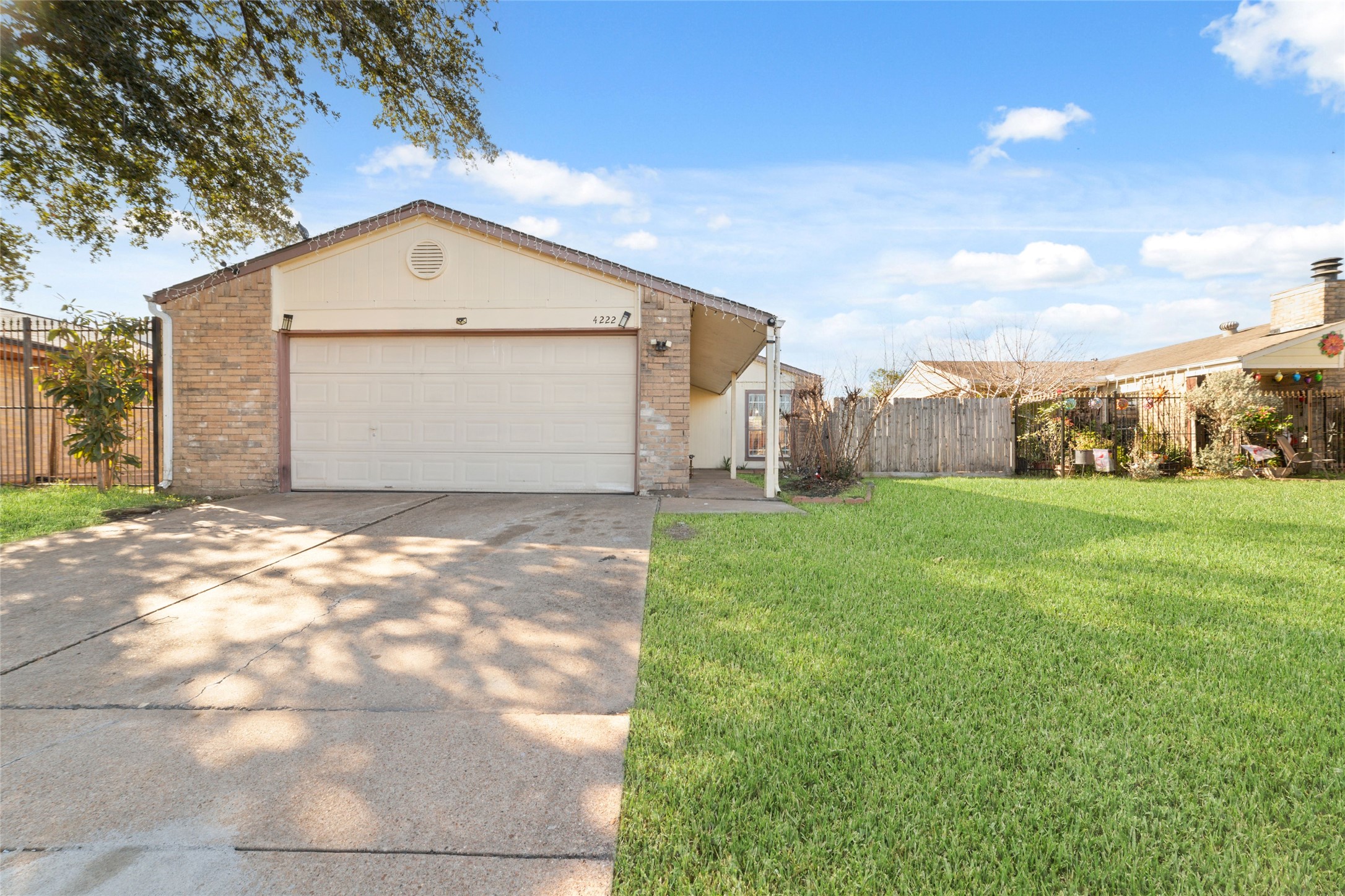 a front view of house with garden