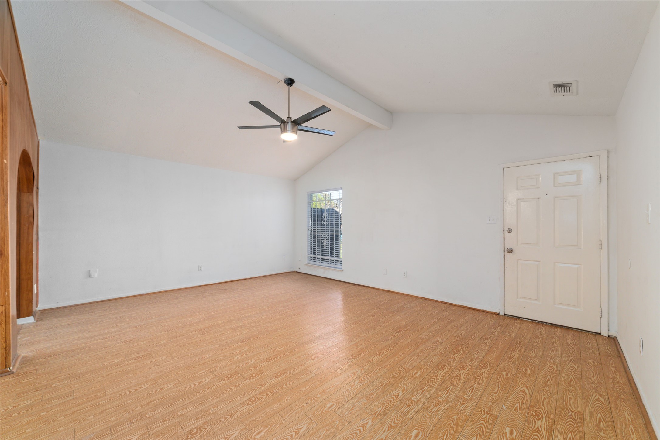 4222 Amir Street Houston, TX 77072 - Photo 5 of 21 an empty room with a empty space and a ceiling fan