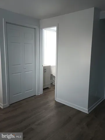 a view of a bathroom from a hallway